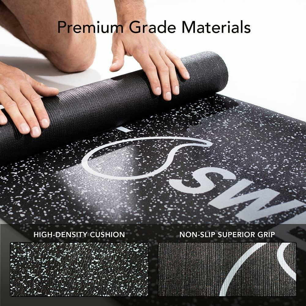 Person rolling up Sweet Sweat® yoga mat.